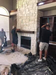 Floor to ceiling brick fireplace renovation